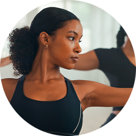 Woman stretching shoulder Woman stretching shoulder