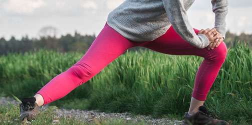 Woman stretching hip